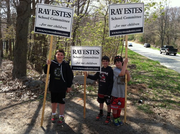 Patrick, Michael, Ryan holding signs